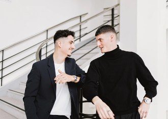 Students from the INSEEC business school laughing in the hall of the Lyon campus